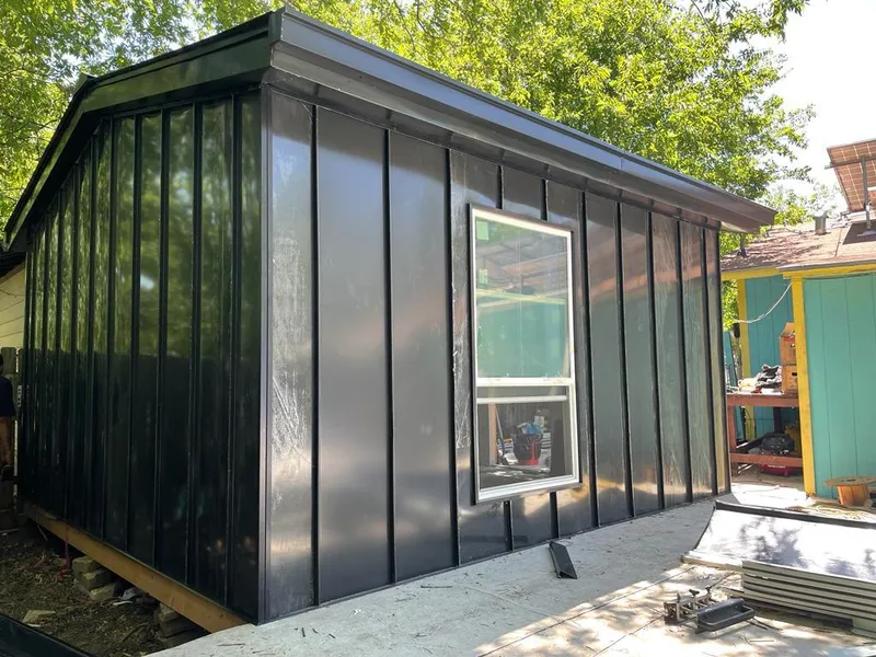 Black standing seam metal wall panels for Roof Inspection in Dundalk