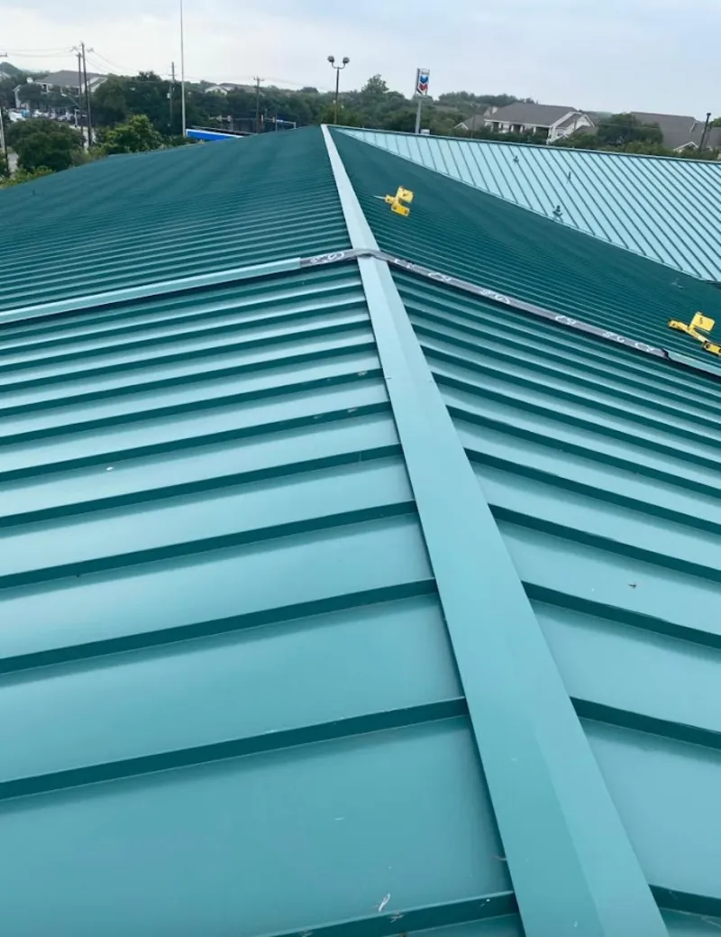 Green commercial metal roof ridge and valley for Metal Roof Repair in Dundalk